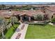 Community clubhouse with a walkway and lush landscaping at 578 E Laddoos Ave, San Tan Valley, AZ 85140
