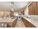 Modern kitchen with wood cabinetry and upgraded features at 578 E Laddoos Ave, San Tan Valley, AZ 85140