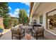 Relaxing back patio with seating area and fire pit at 578 E Laddoos Ave, San Tan Valley, AZ 85140