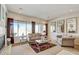 Living room with large windows, fireplace, and stylish decor at 3660 S Golden Eye Ln, Gold Canyon, AZ 85118