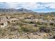 Aerial view of community, showcasing homes and mountain views at 3660 S Golden Eye Ln, Gold Canyon, AZ 85118