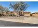 House exterior with a two-car garage and desert landscaping at 3660 S Golden Eye Ln, Gold Canyon, AZ 85118