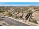 Aerial view of a residential neighborhood showcasing homes and desert landscape at 3660 S Golden Eye Ln, Gold Canyon, AZ 85118