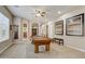 Game room with pool table, large windows, and comfortable seating at 3660 S Golden Eye Ln, Gold Canyon, AZ 85118