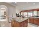 Open concept kitchen with breakfast bar overlooking Gathering room at 3660 S Golden Eye Ln, Gold Canyon, AZ 85118