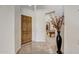Elegant entryway with tile flooring, wood door, and view to game room at 3660 S Golden Eye Ln, Gold Canyon, AZ 85118