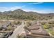 Aerial view of a residential neighborhood nestled in a mountainous area at 3660 S Golden Eye Ln, Gold Canyon, AZ 85118