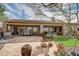 Backyard with a flagstone patio, seating area, and putting green at 3660 S Golden Eye Ln, Gold Canyon, AZ 85118