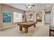 Game room boasting a pool table and natural light from a large window at 3660 S Golden Eye Ln, Gold Canyon, AZ 85118