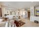 Spacious living area showcasing large mirrors and comfortable seating at 3660 S Golden Eye Ln, Gold Canyon, AZ 85118