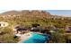 Community pool and spa with surrounding lounge area and mountain backdrop at 2529 W Florentine Rd, Phoenix, AZ 85086