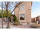 Tan two-story house with landscaping, sidewalk, and a utility box at 2529 W Florentine Rd, Phoenix, AZ 85086