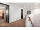 Upstairs hallway with carpet and neutral decor at 2529 W Florentine Rd, Phoenix, AZ 85086