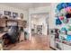Home office with built-in shelving and a workspace at 2529 W Florentine Rd, Phoenix, AZ 85086