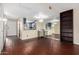 Open dining area with wood floors and kitchen views at 1601 W Sunnyside Dr # 154, Phoenix, AZ 85029