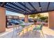 Relaxing patio area with table and chairs at 1601 W Sunnyside Dr # 154, Phoenix, AZ 85029