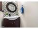 Small bathroom with dark vanity and mosaic tile at 1601 W Sunnyside Dr # 154, Phoenix, AZ 85029