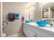 Updated bathroom with double vanity and stylish sinks at 1601 W Sunnyside Dr # 154, Phoenix, AZ 85029
