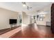 Open living room with a view into the kitchen and patio at 1601 W Sunnyside Dr # 154, Phoenix, AZ 85029