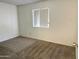 Spacious bedroom with neutral carpeting and window at 7006 E Jensen St # 83, Mesa, AZ 85207