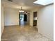 Bright dining area with tile floors and views into the living room and kitchen at 7006 E Jensen St # 83, Mesa, AZ 85207