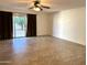 Living room features tile floors and sliding glass doors to patio at 7006 E Jensen St # 83, Mesa, AZ 85207