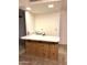 Convenient wet bar with wood cabinetry and a single sink at 7006 E Jensen St # 83, Mesa, AZ 85207