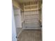 Spacious walk-in closet with ample shelving and hanging space at 38422 W Buckeye Rd, Tonopah, AZ 85354