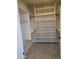 Spacious walk-in closet with ample shelving and hanging space at 38422 W Buckeye Rd, Tonopah, AZ 85354