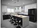 Modern kitchen with island and stainless steel appliances at 38422 W Buckeye Rd, Tonopah, AZ 85354