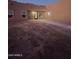 House exterior at dusk with landscaping at 38422 W Buckeye Rd, Tonopah, AZ 85354