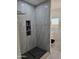 Spa-like shower with marble tile and rainfall showerhead at 38422 W Buckeye Rd, Tonopah, AZ 85354
