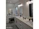 Elegant bathroom with double vanity and walk-in shower at 38422 W Buckeye Rd, Tonopah, AZ 85354