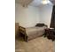 Small bedroom with a single bed and nightstand at 1618 N 52Nd Dr, Phoenix, AZ 85035