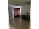 Spacious bedroom with tile flooring and a ceiling fan at 1618 N 52Nd Dr, Phoenix, AZ 85035