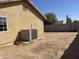 Large backyard with block wall and AC unit at 1129 E Love St, Casa Grande, AZ 85122