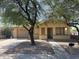 Charming single-story home with a well-maintained front yard at 1129 E Love St, Casa Grande, AZ 85122