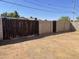 Wooden gates leading to the backyard at 1129 E Love St, Casa Grande, AZ 85122