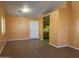 Bright living room with laminate flooring and view of kitchen at 1129 E Love St, Casa Grande, AZ 85122