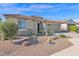 Single story home with desert landscaping and two-car garage at 27152 N 71St Ave --, Peoria, AZ 85383