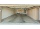 Attached garage with storage cabinets and utility sink at 19051 N Aztec Point Dr, Surprise, AZ 85387