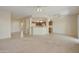 Open kitchen with breakfast bar and wood cabinets at 19051 N Aztec Point Dr, Surprise, AZ 85387