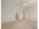 Spacious bedroom featuring a ceiling fan and ensuite bathroom access at 19051 N Aztec Point Dr, Surprise, AZ 85387