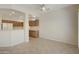 Dining area with tile flooring and kitchen views at 19051 N Aztec Point Dr, Surprise, AZ 85387