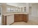 Kitchen boasts wood cabinets and a dishwasher at 19051 N Aztec Point Dr, Surprise, AZ 85387