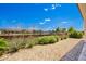 Landscaped backyard with gravel and drought-tolerant plants at 36169 N Serrano Ave, Queen Creek, AZ 85140