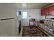 Cozy living area with a sofa and built-in cabinets at 8700 E University Dr # 1322, Mesa, AZ 85207
