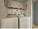 Laundry room complete with washer and dryer at 8700 E University Dr # 1322, Mesa, AZ 85207