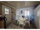 Bright sunroom with table and chairs, perfect for relaxing at 8700 E University Dr # 1322, Mesa, AZ 85207
