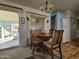Bright dining area with wood table and chairs, view to backyard at 8700 E University Dr # 1322, Mesa, AZ 85207